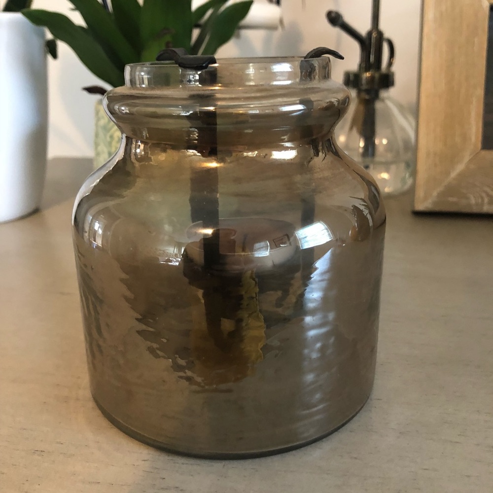 Glass tea light holder